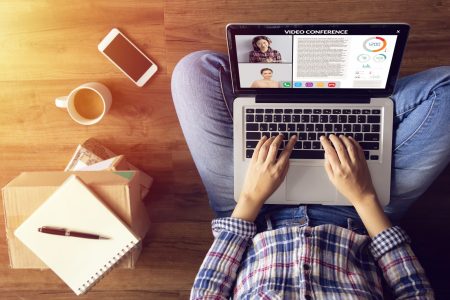 work from home. people making video conference with colleague via laptop computer during home quarantine to avoid spreading illness transmission of COVID-19 Coronavirus outbreak. Social distancing